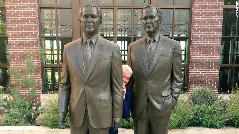 Bill Clinton Between Two Bushes Photograph