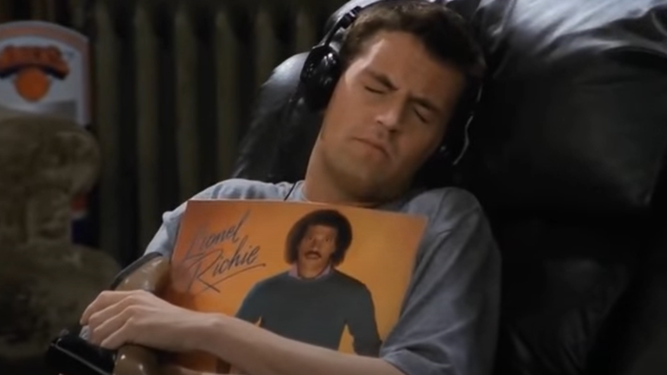 Chandler Bing Hugging a Record Meme Template