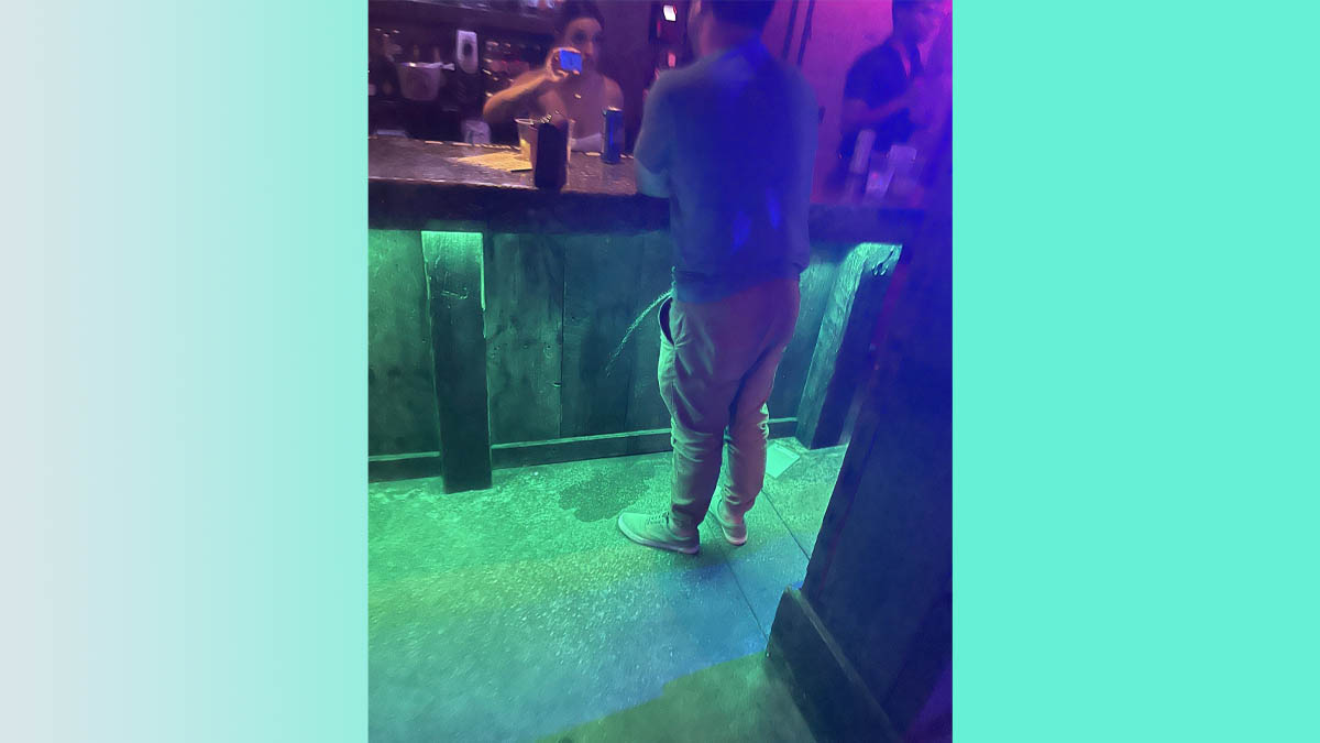 Drunk Guy Pissing at Bar