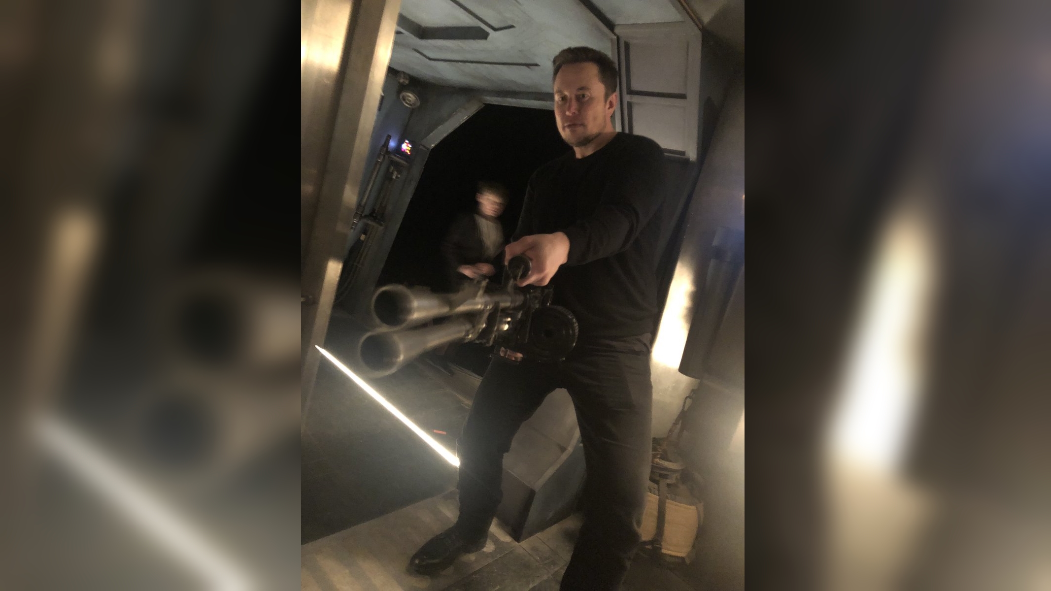 Elon Musk Holding a Minigun Meme Template