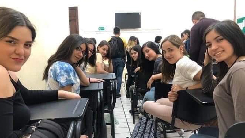 Girls in Class Looking Back