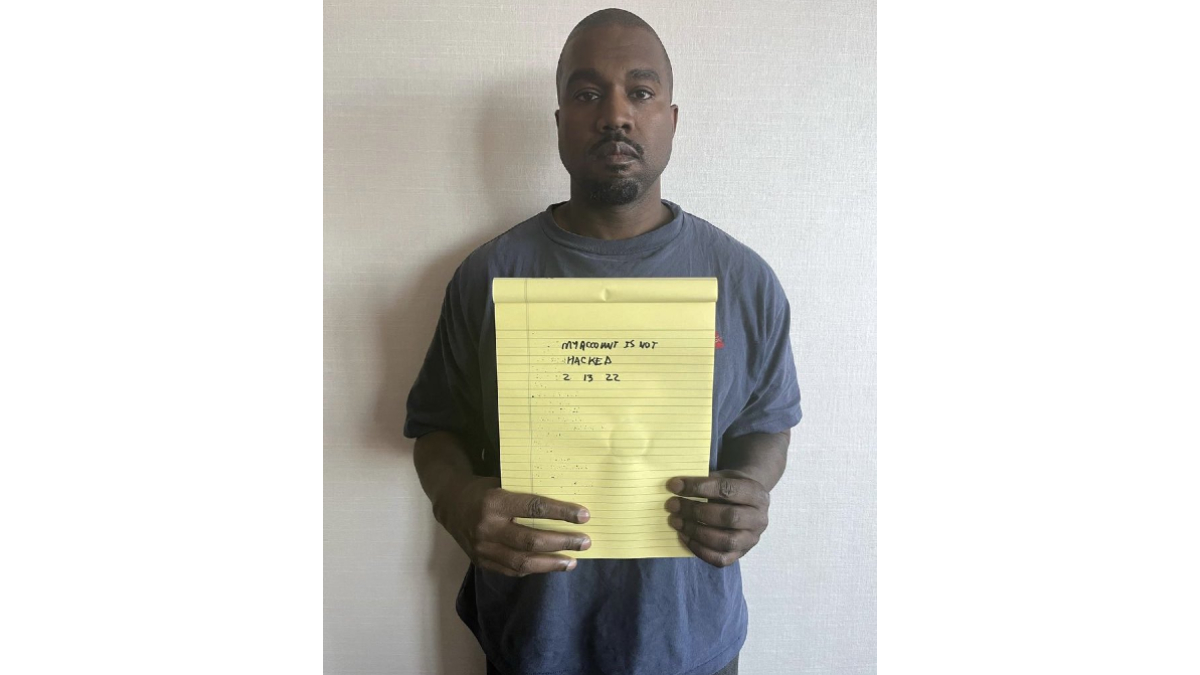 Kanye West Holding Notepad Meme Template