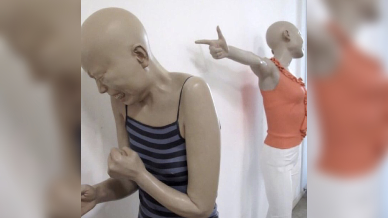 Mannequin Pointing at Crying Mannequin / This MF Paid For Twitter