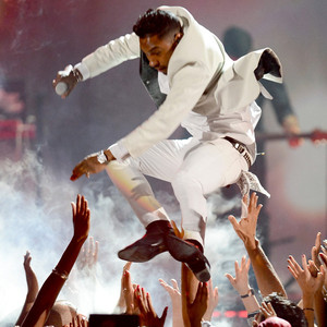 Miguel's Fan-Kicking Stage Dive