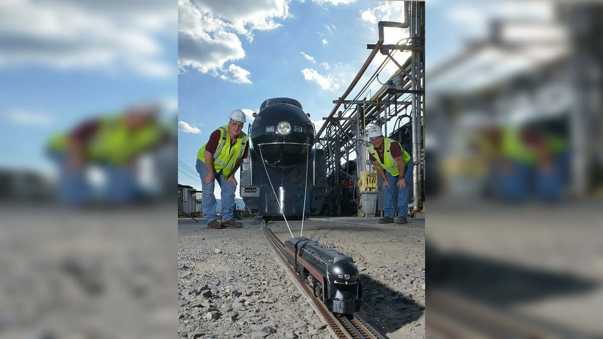 Small Train Pulling Big Train