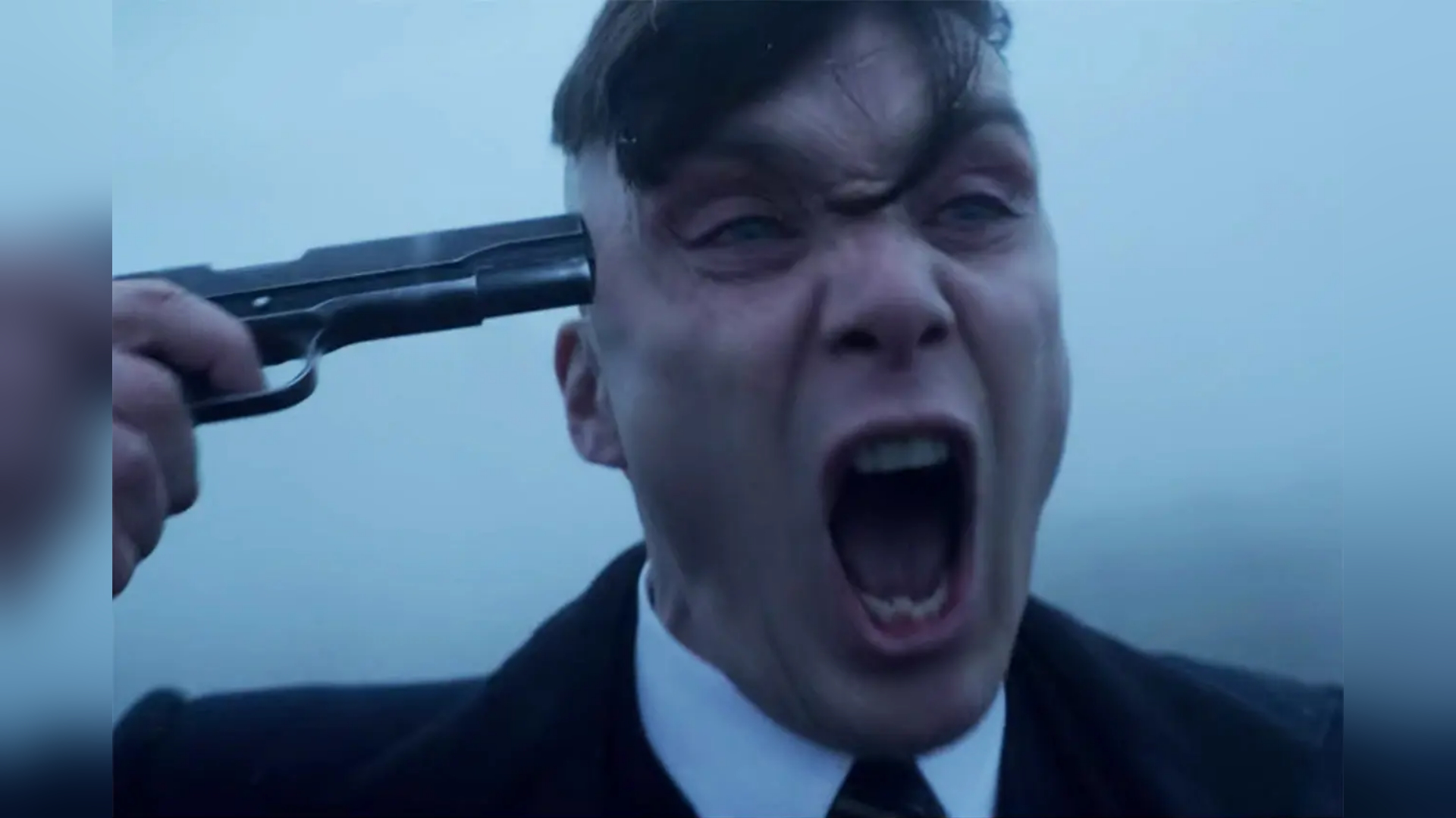Tommy Shelby Holding a Gun to His Head