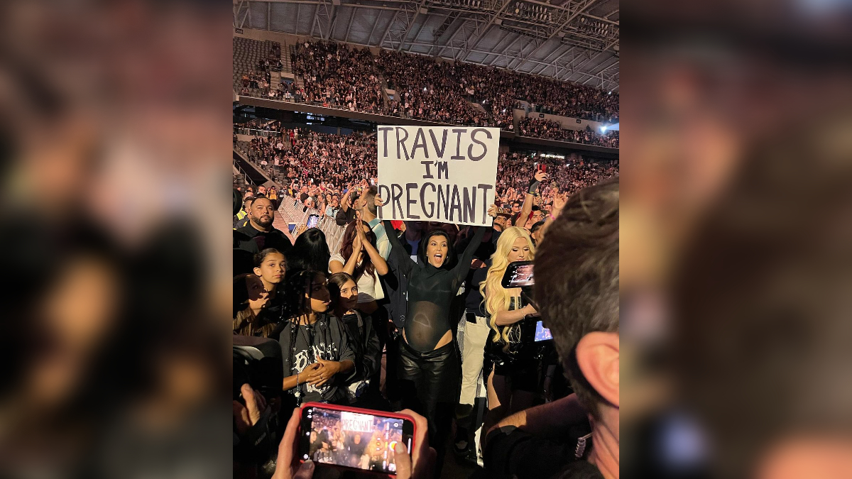Travis I'm Pregnant Sign